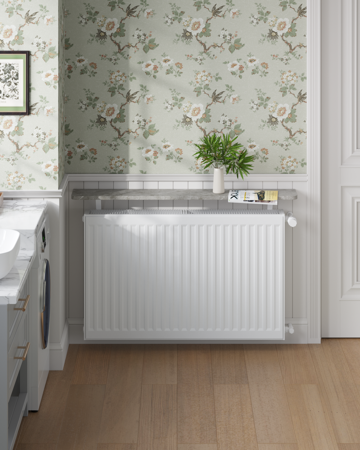After — the same radiator with a Loby shelf above it, styled with a plant and books