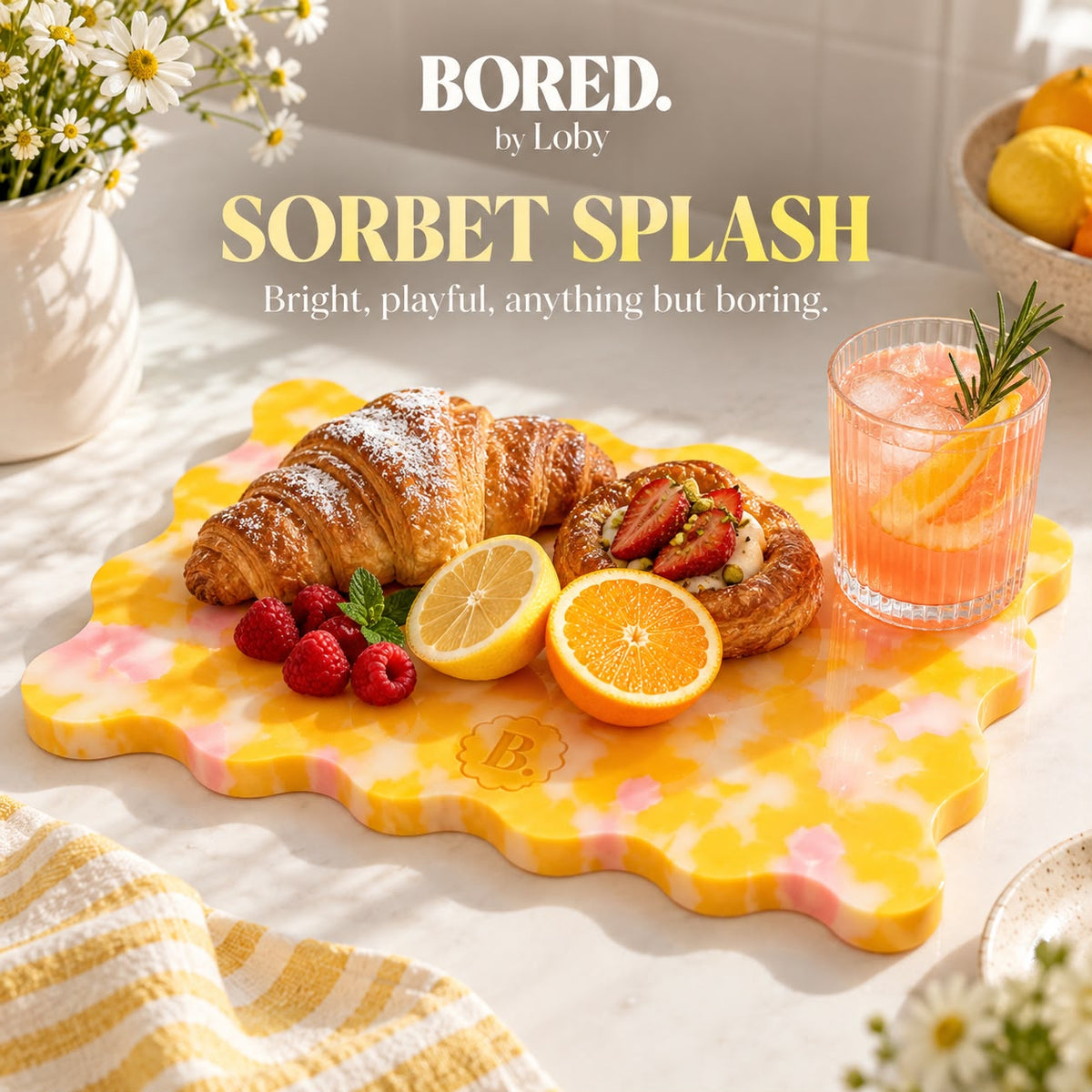 BORED. by Loby Sorbet Splash statement board styled with pastries and citrus