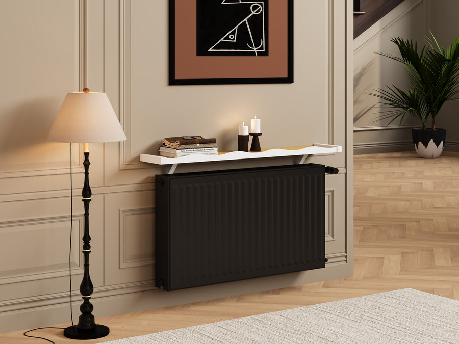 White & Natural — Loby Wavy radiator shelf fitted in a living room, styled with books and candles