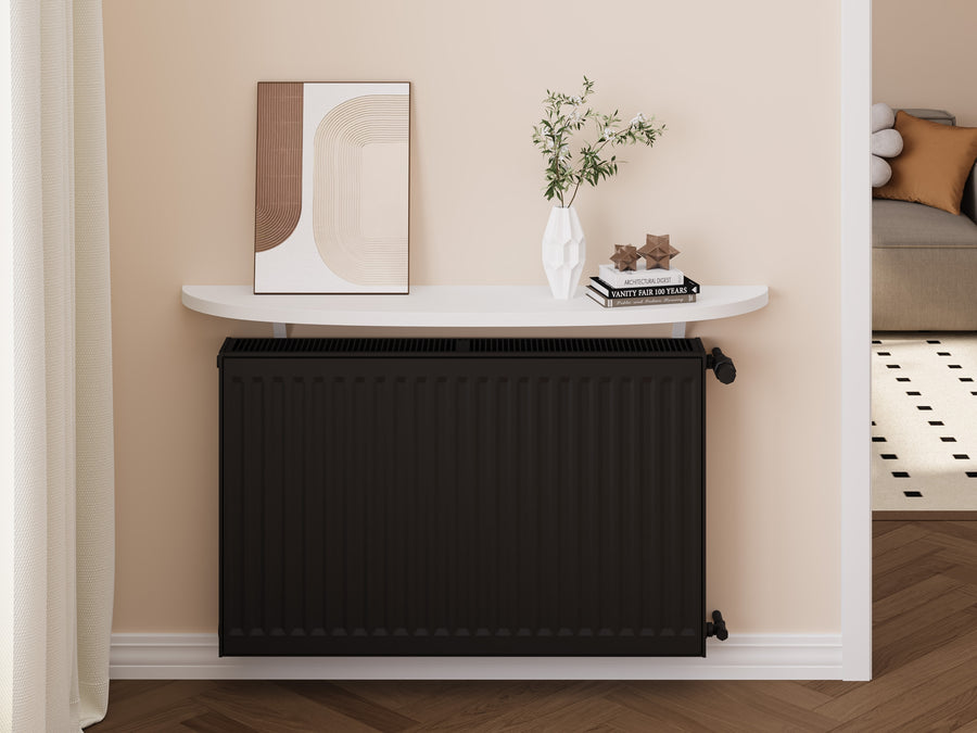 White — Arc radiator shelf styled above a radiator with books and a vase