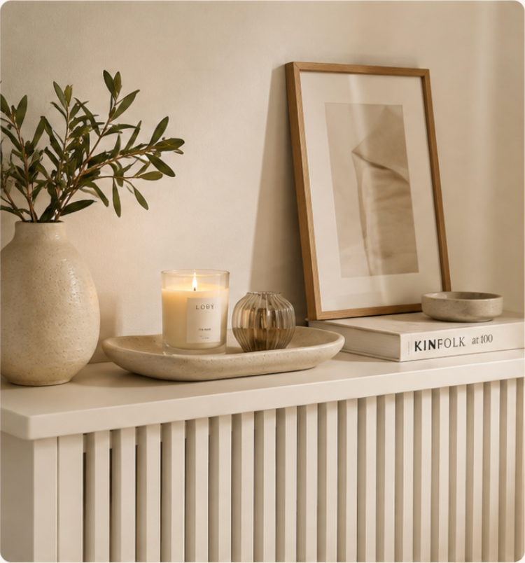 A Loby radiator shelf styled with decorative accessories in a modern UK home