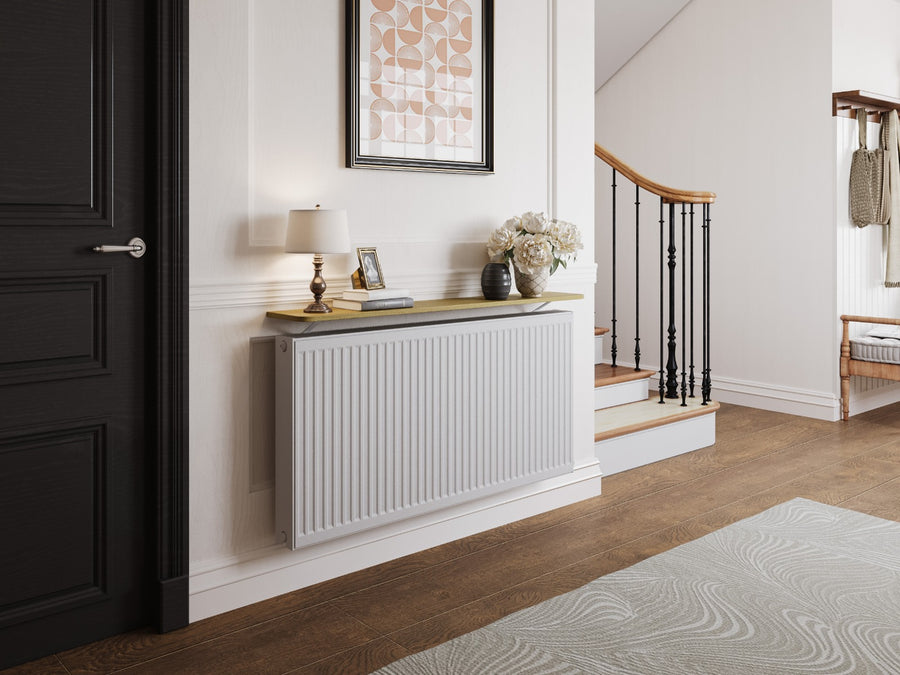 A Loby radiator shelf above a radiator in a hallway