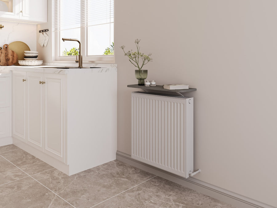A Loby radiator shelf above a radiator in a kitchen
