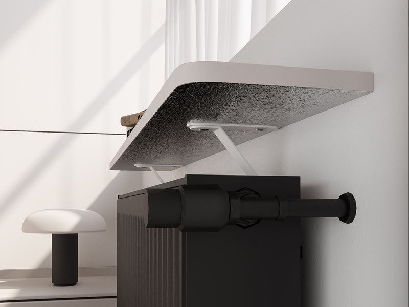Close-up of the aluminium foil underside of a Loby Thermal radiator shelf