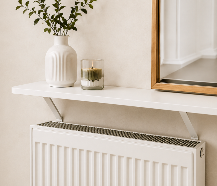 Essential radiator shelf, shown in a styled UK living space with the shelf profile clearly visible