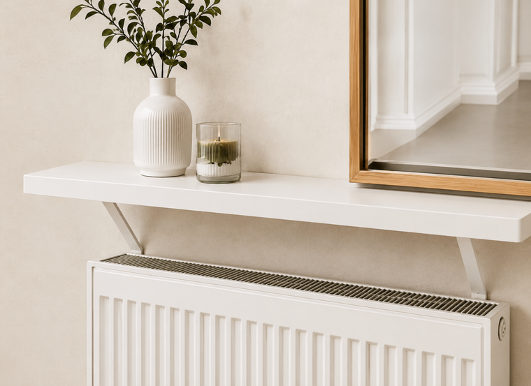 Pine radiator shelf, shown in a styled UK living space with the shelf profile clearly visible