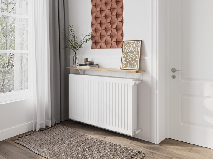 Natural — Loby Thermal radiator shelf in natural, fitted above a radiator in a home interior