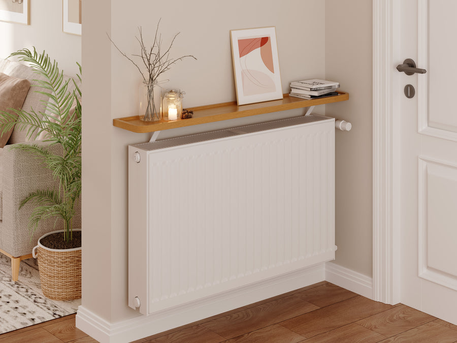 Natural — Loby Curve radiator shelf in natural, fitted above a radiator in a home interior