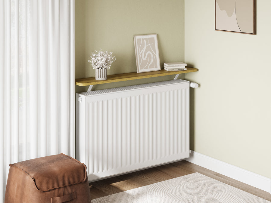 Light Oak — Loby Essential radiator shelf in light oak, fitted above a radiator in a home interior