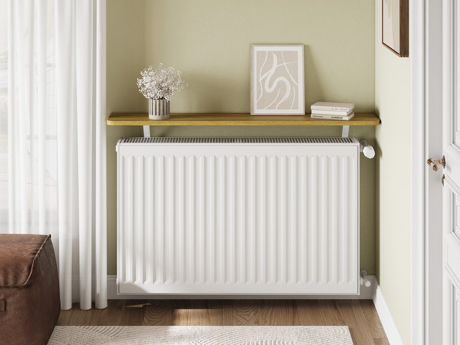 Light Oak — Loby Essential radiator shelf in light oak, fitted above a radiator in a home interior