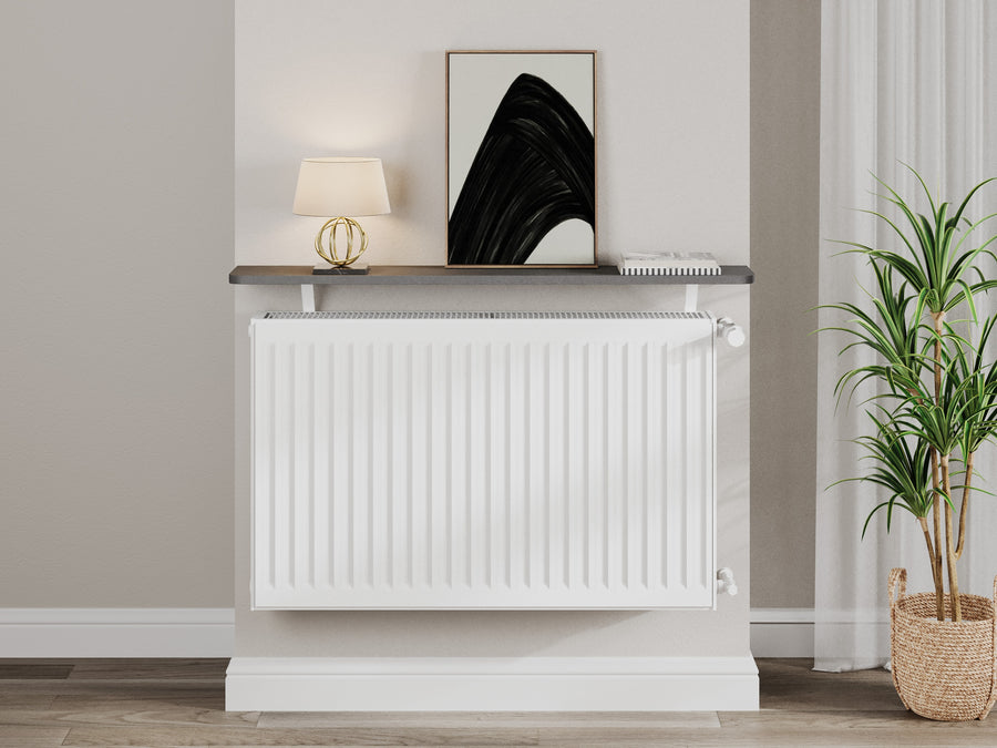 Grey — Loby Essential radiator shelf in grey, fitted above a radiator in a home interior