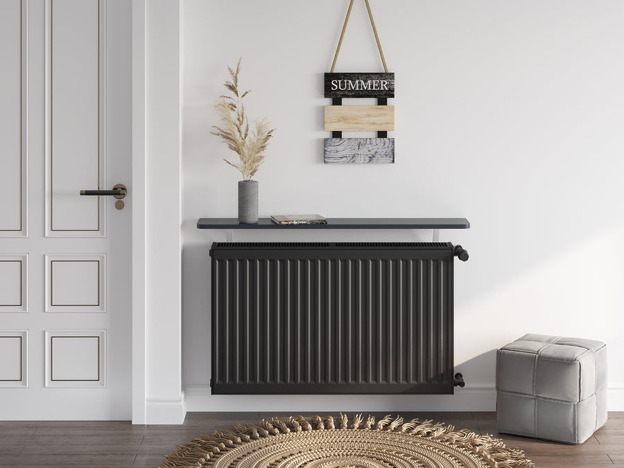 Black — Loby Thermal radiator shelf in black, fitted above a radiator in a home interior